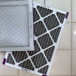 Dirty & clean overhead home filter which is important to change as recomended for good air quality